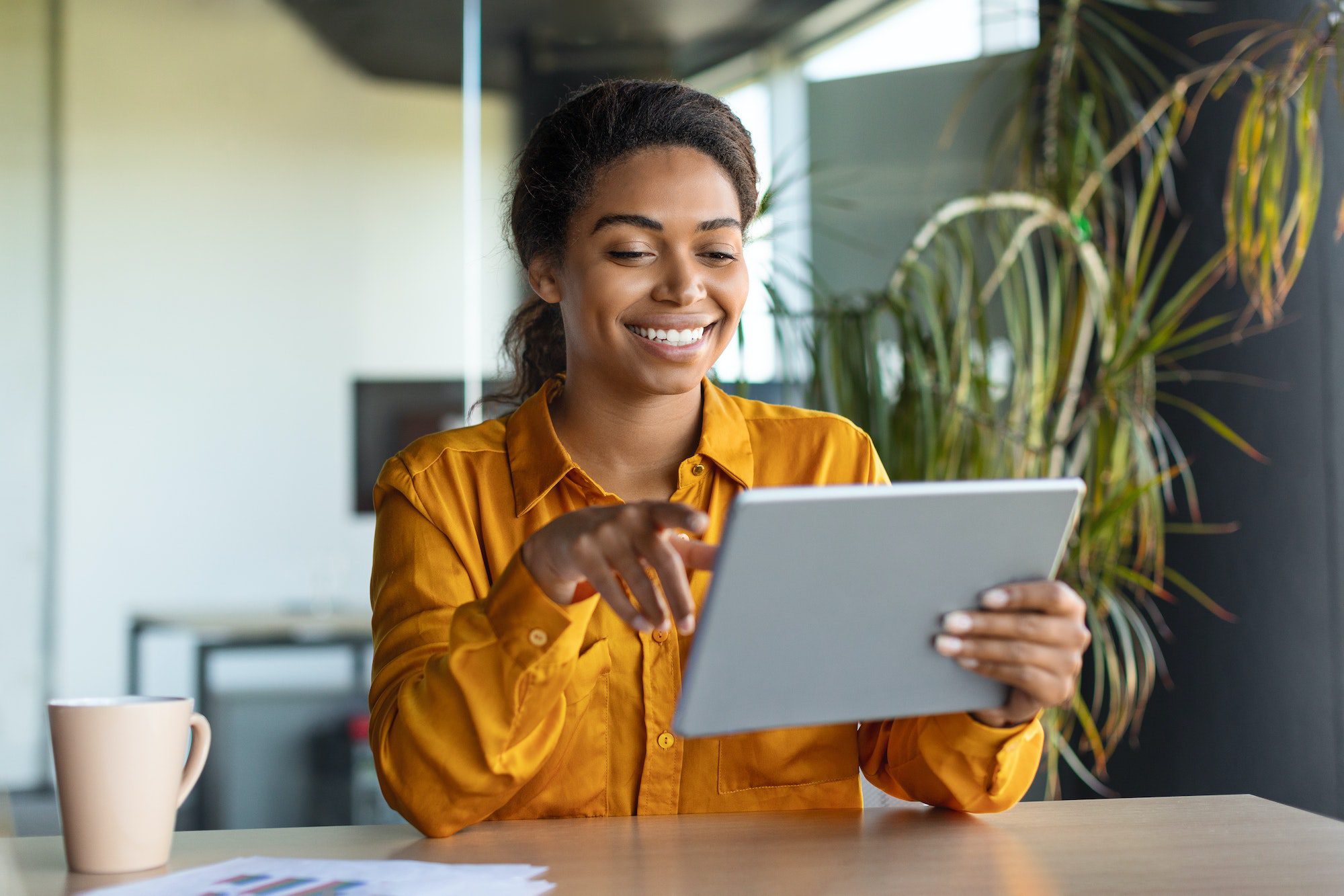 happy black businesswoman enjoying our web design services